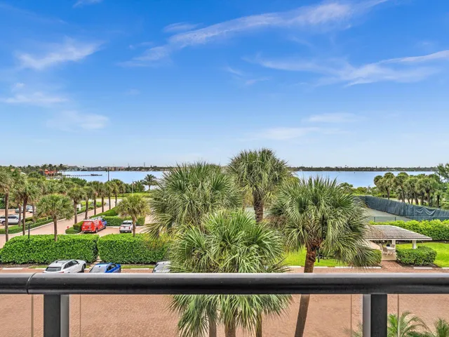 a view of walk in closet with clothes