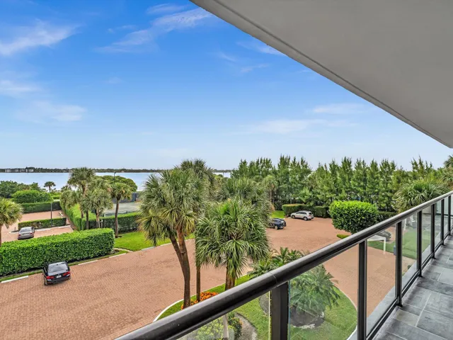 a living room with furniture rug and window