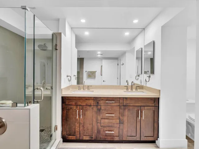 a view of a swimming pool and outdoor seating