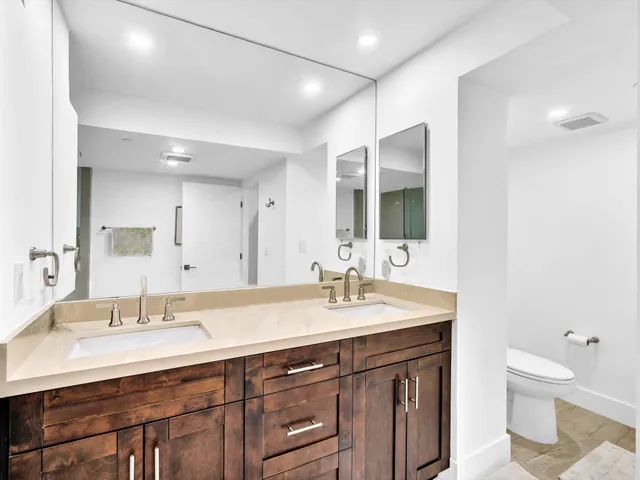 a view of a swimming pool with a lounge chairs