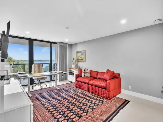 a view of a large building with a yard