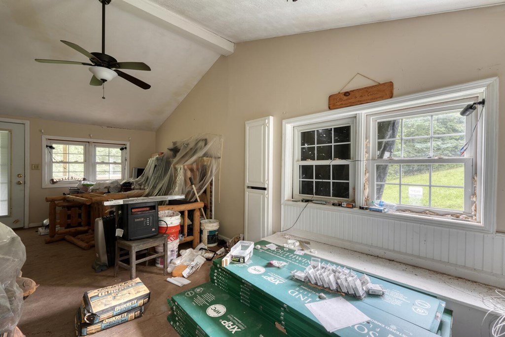580 Emmaus Road Epworth, GA 30541 - Photo 15 of 33 a bedroom with furniture and a window