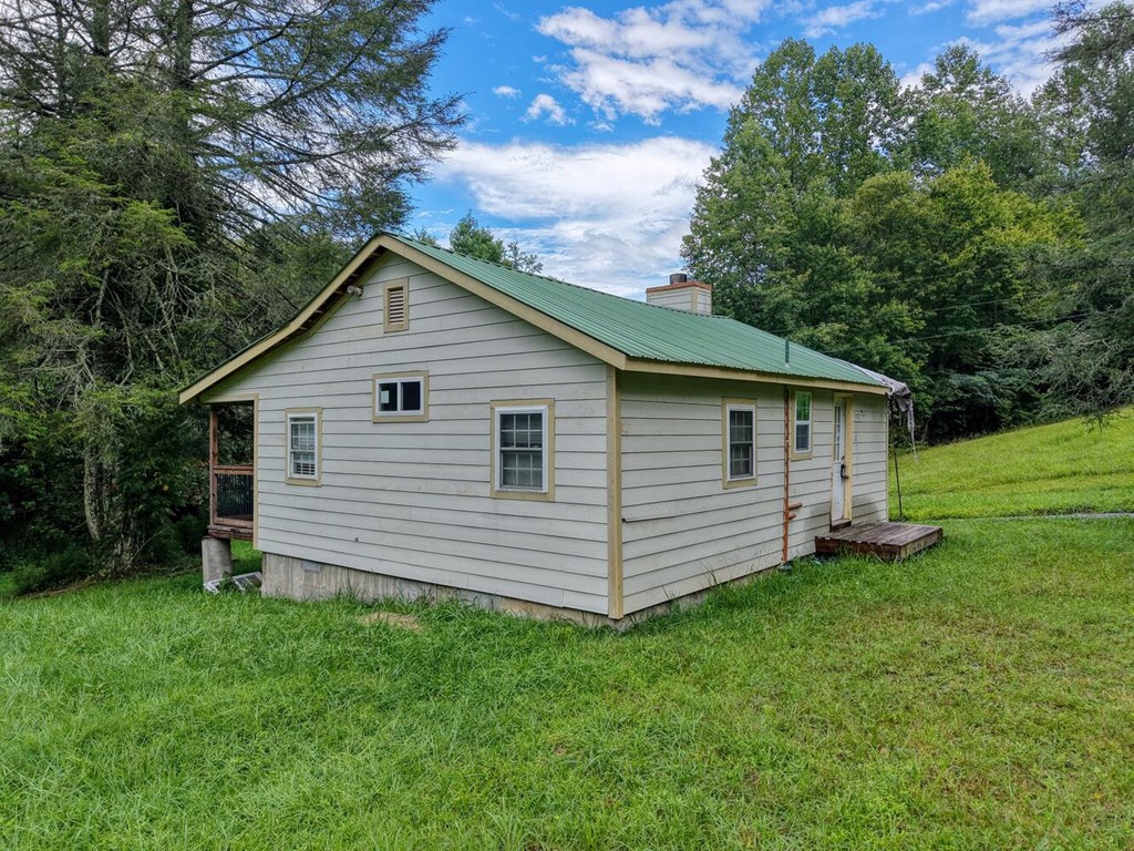 580 Emmaus Road Epworth, GA 30541 - Photo 5 of 33 a view of a house with a yard