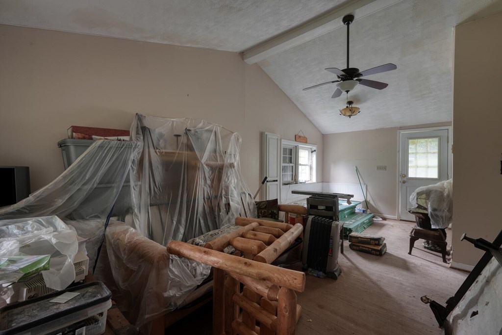 580 Emmaus Road Epworth, GA 30541 - Photo 7 of 33 a living room with furniture and wooden floor