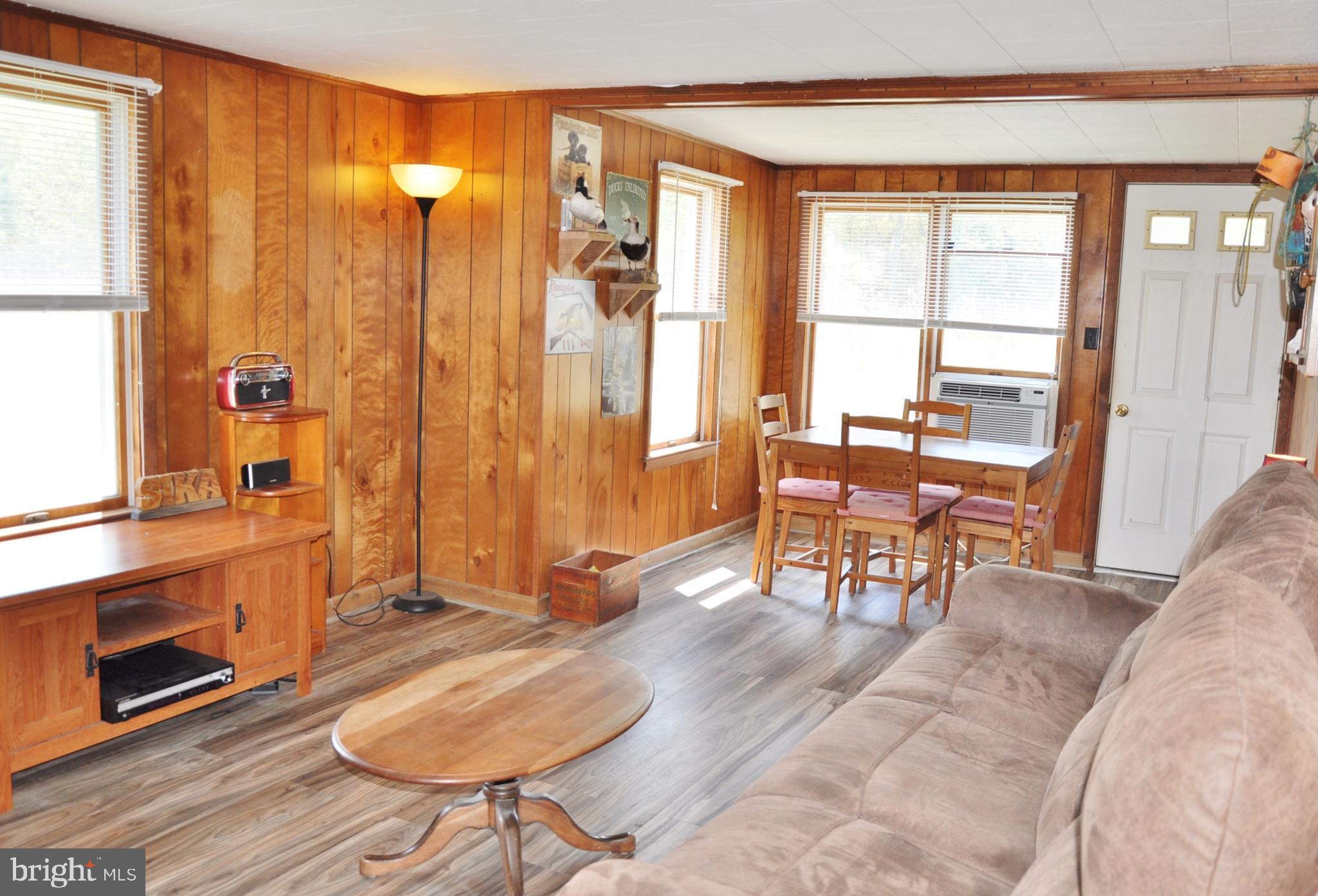 2432 Andrews Road Crapo, MD 21626 - Photo 32 of 60 Newer flooring and open living room/dining room.