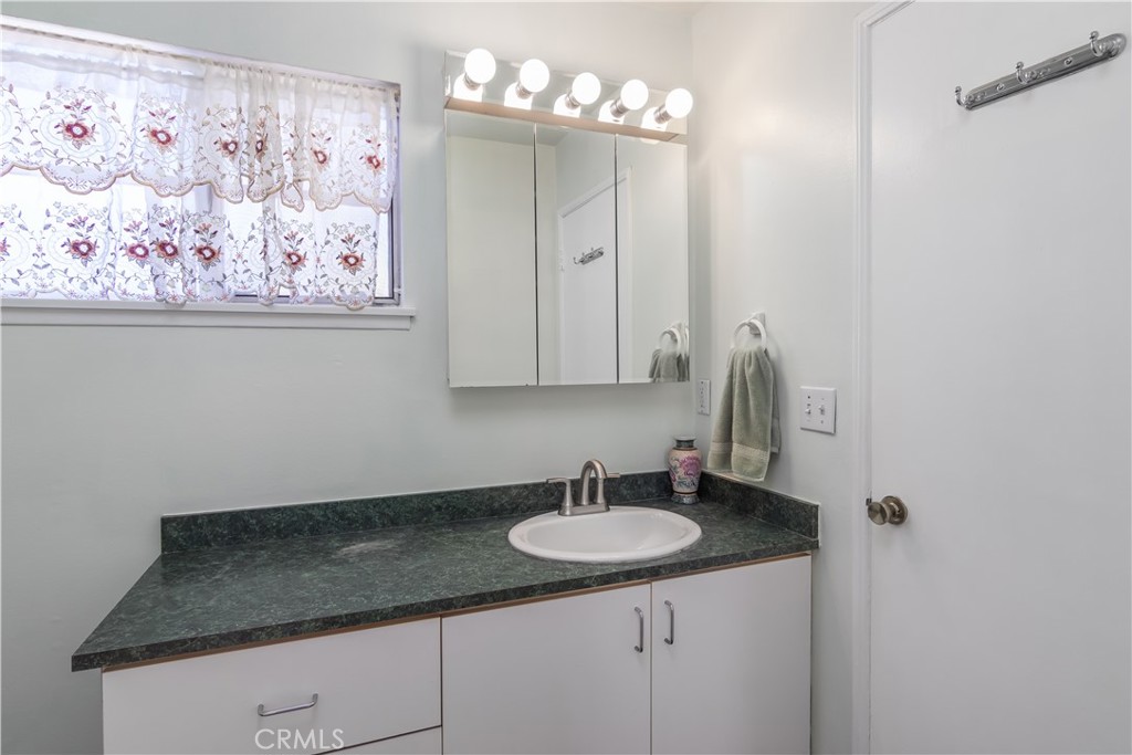 11543 Swinton Avenue Granada Hills, CA 91344 - Photo 19 of 24 a sink with a vanity