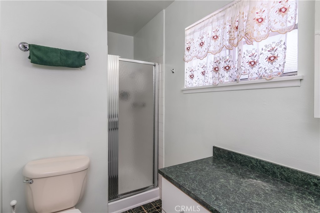 11543 Swinton Avenue Granada Hills, CA 91344 - Photo 20 of 24 a bathroom with a toilet