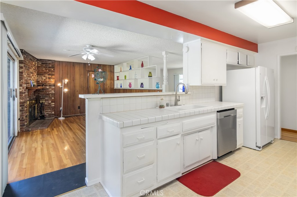 11543 Swinton Avenue Granada Hills, CA 91344 - Photo 10 of 24 a spacious bathroom with a sink and a mirror