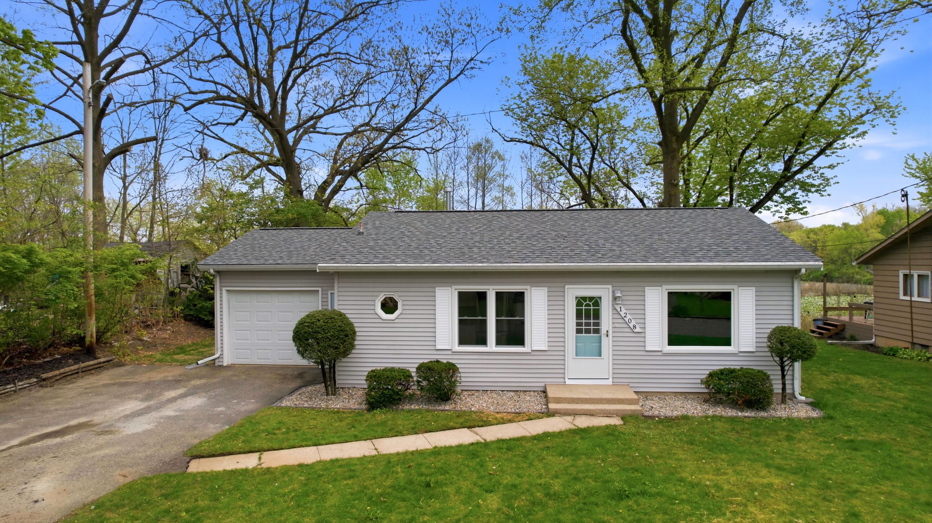 1208 Riley Court La Porte, IN 46350 - Photo 1 of 36 a view of house with backyard