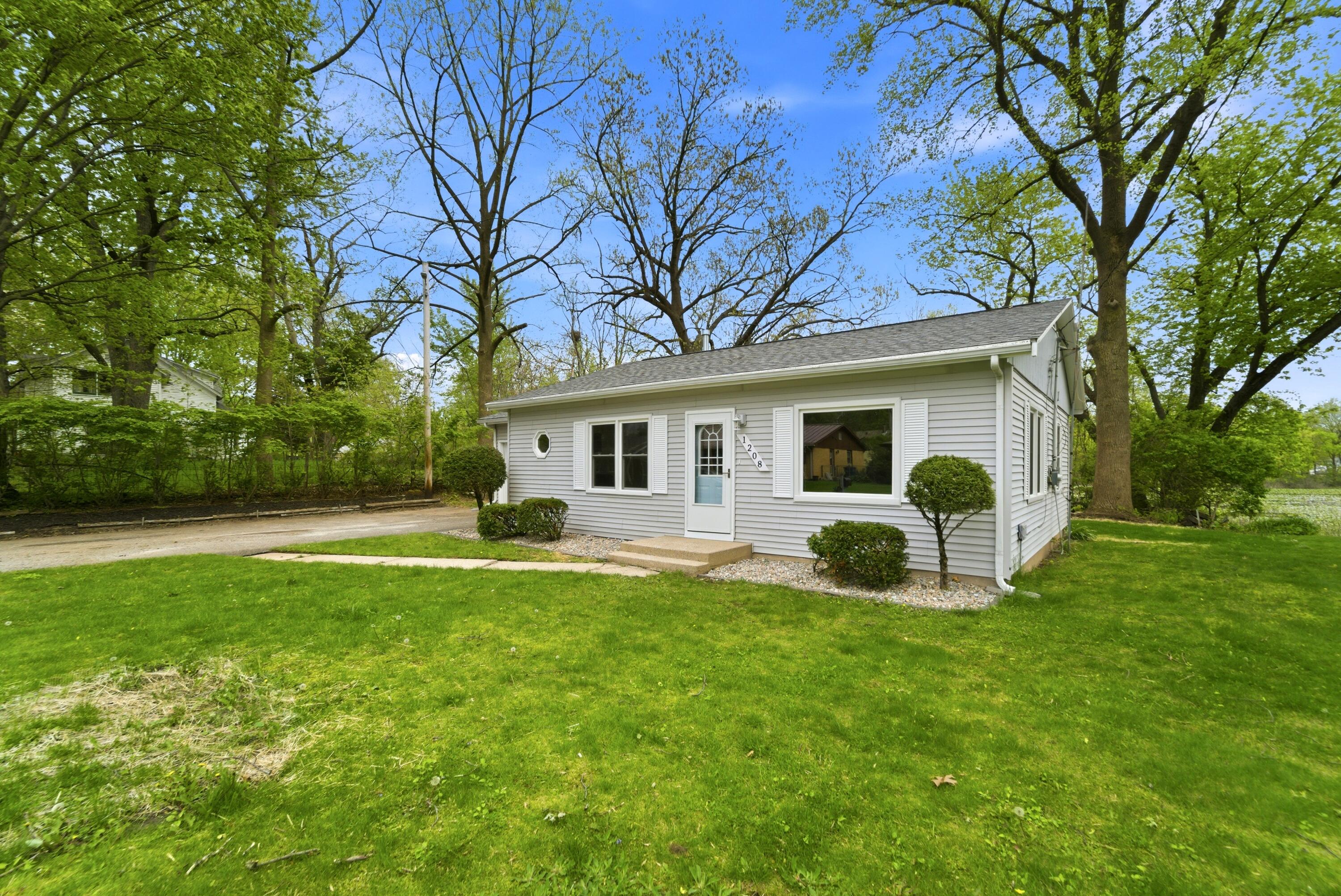 1208 Riley Court La Porte, IN 46350 - Photo 2 of 36 a view of a house with a backyard