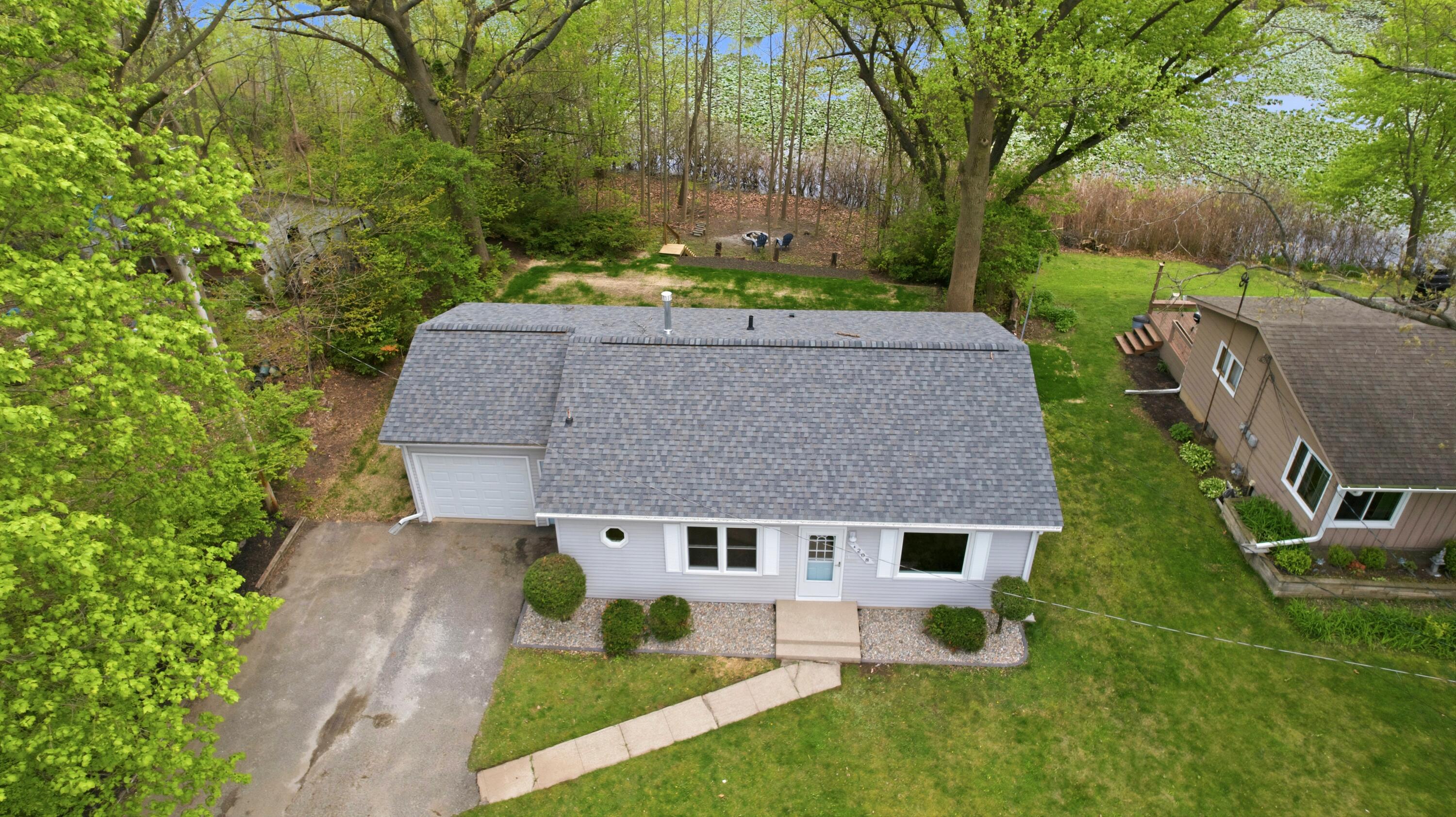 1208 Riley Court La Porte, IN 46350 - Photo 26 of 36 front view of house with a yard