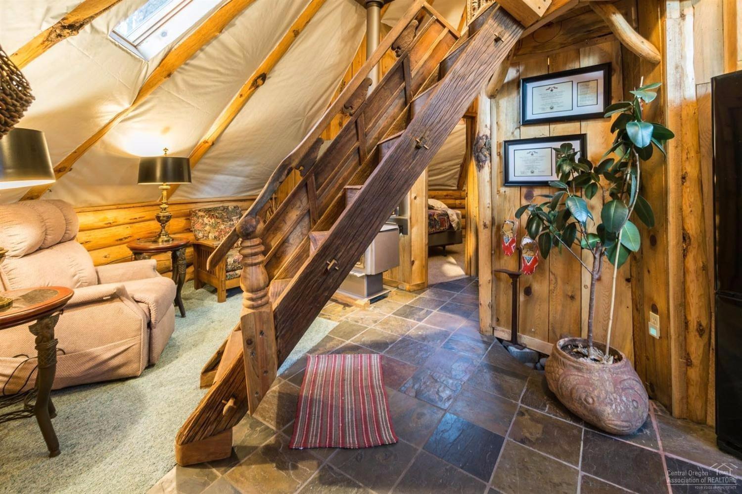 2510 Rohlfing Circle La Pine, OR 97739 - Photo 7 of 23 Built around a large Ponderosa, this is