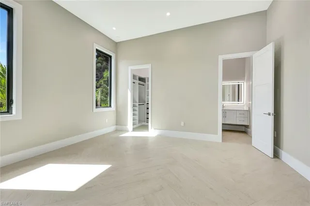 an empty room with windows