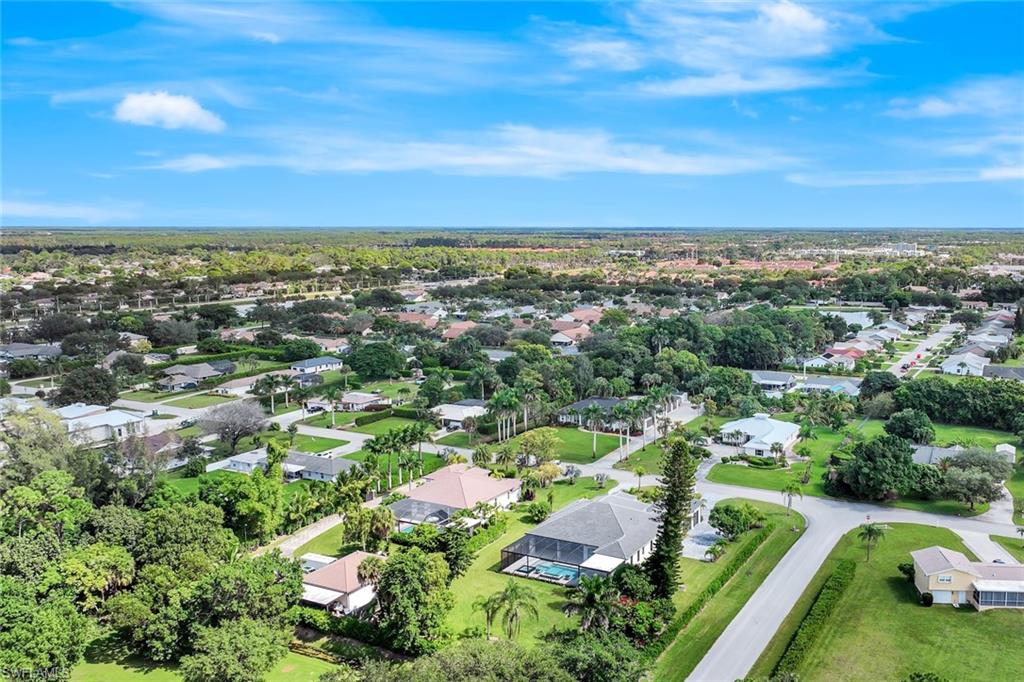 10493 Winterview Drive Naples, FL 34110 - Photo 35 of 40 a view of a city with mountains in the background