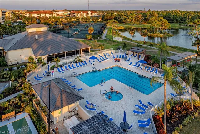 an aerial view of a house swimming pool and outdoor space
