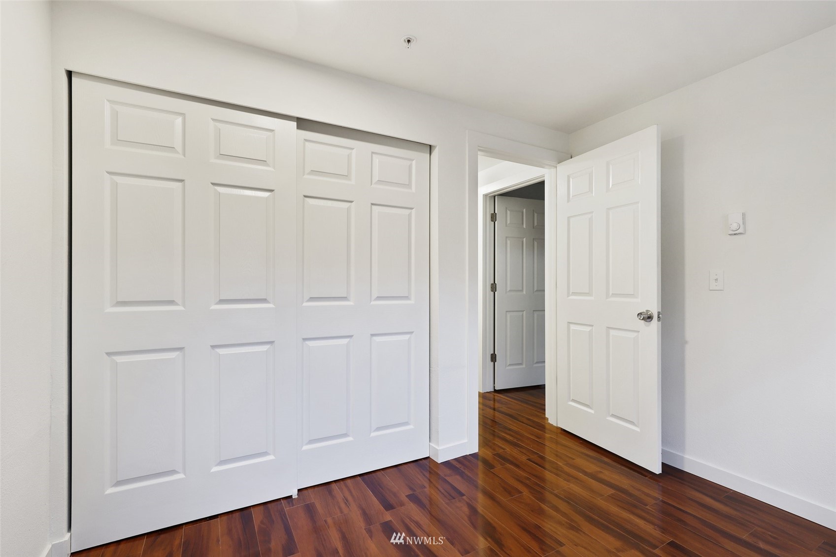 949 Aberdeen Avenue Northeast, Unit B104 Renton, WA 98056 - Photo 11 of 20 a view of empty room with wooden floor