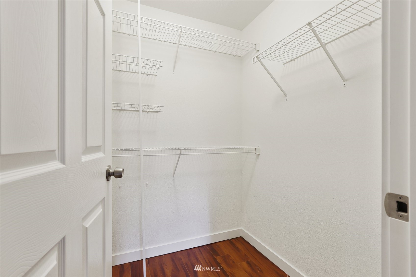 949 Aberdeen Avenue Northeast, Unit B104 Renton, WA 98056 - Photo 14 of 20 a view of a room with racks on the wall