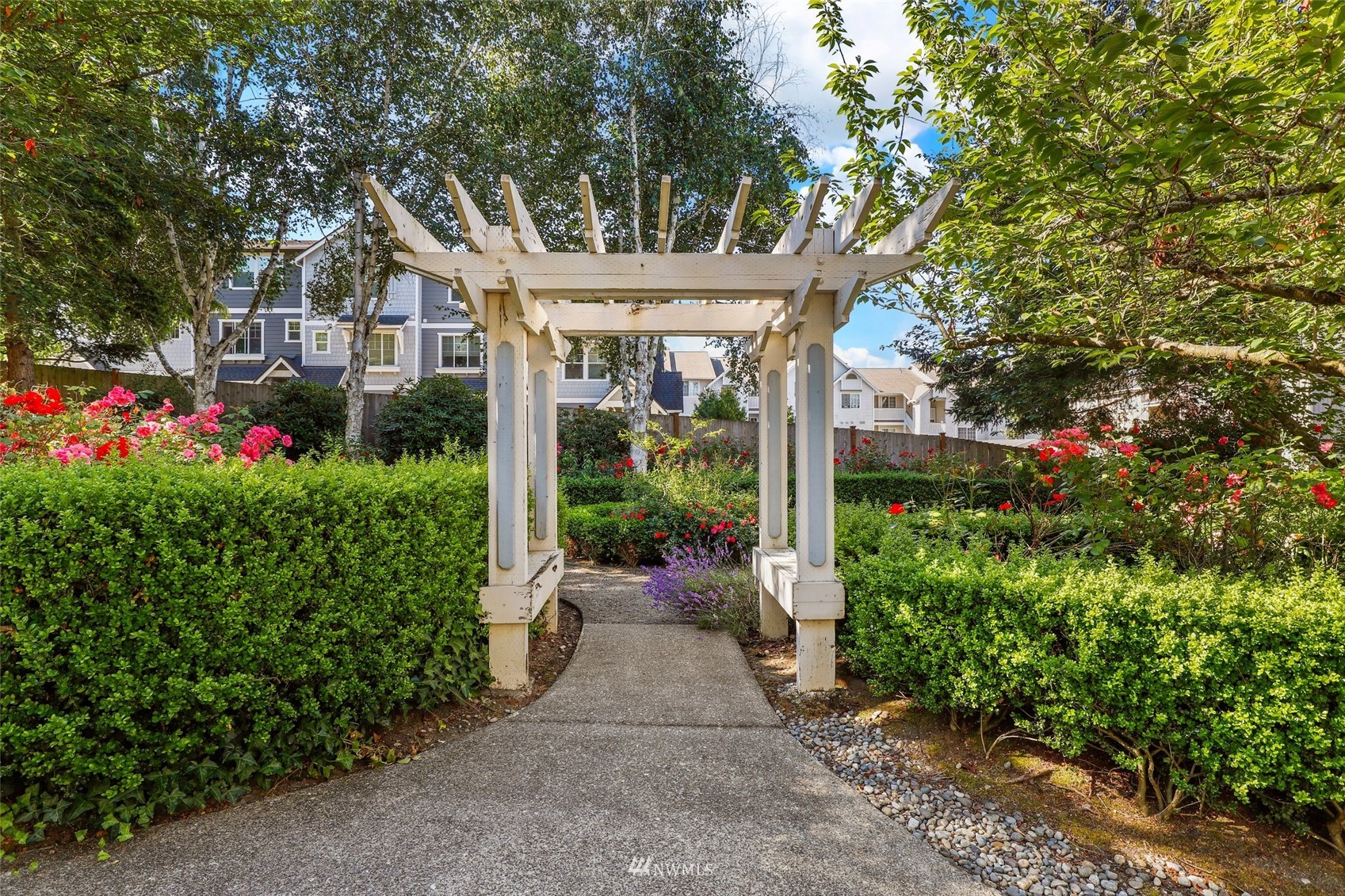 949 Aberdeen Avenue Northeast, Unit B104 Renton, WA 98056 - Photo 17 of 20 a view of a house with garden and plants