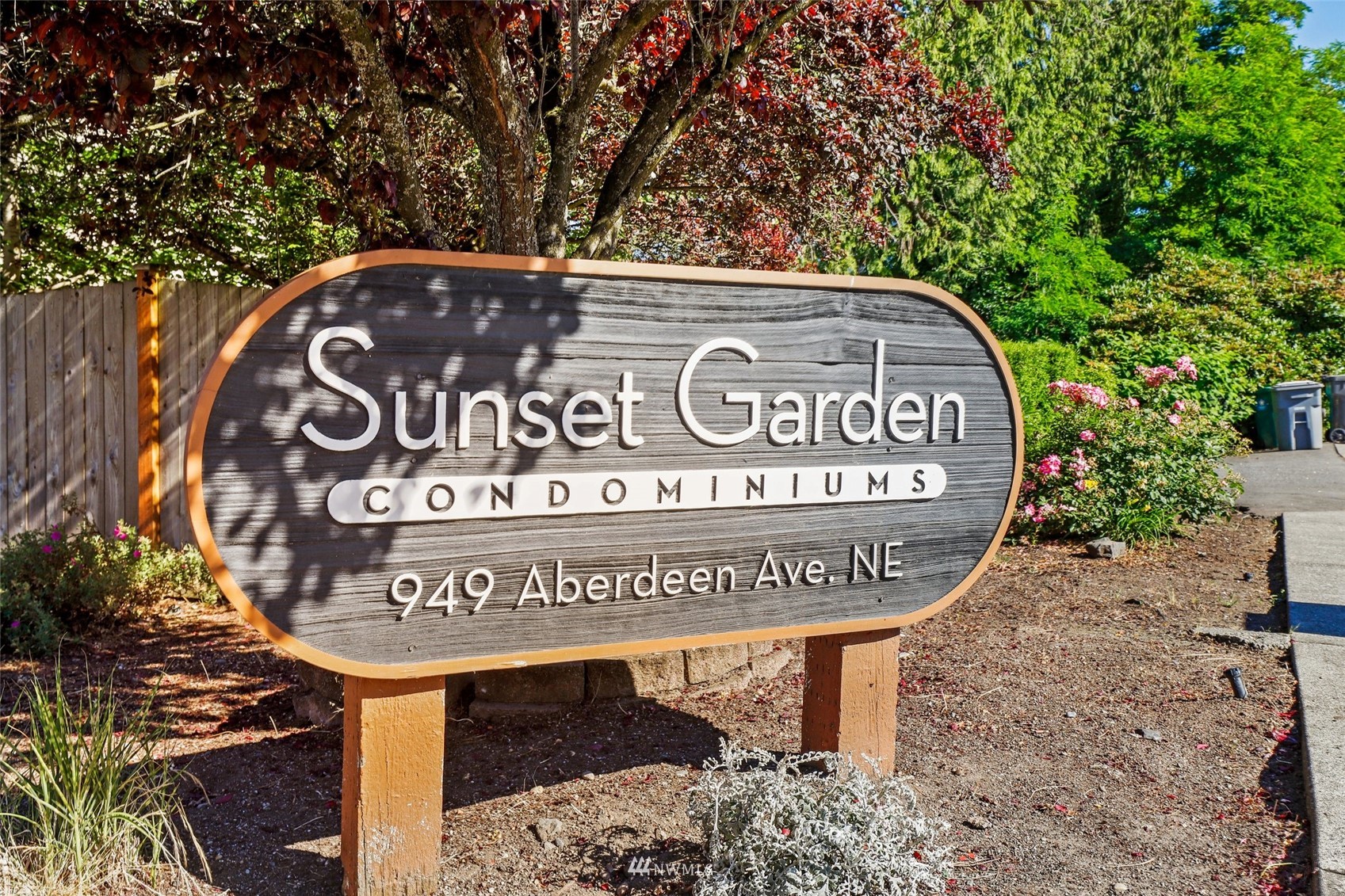 949 Aberdeen Avenue Northeast, Unit B104 Renton, WA 98056 - Photo 19 of 20 a view of outdoor space with sign board
