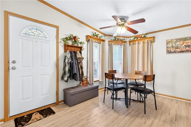 a view of a livingroom with furniture and wooden floor