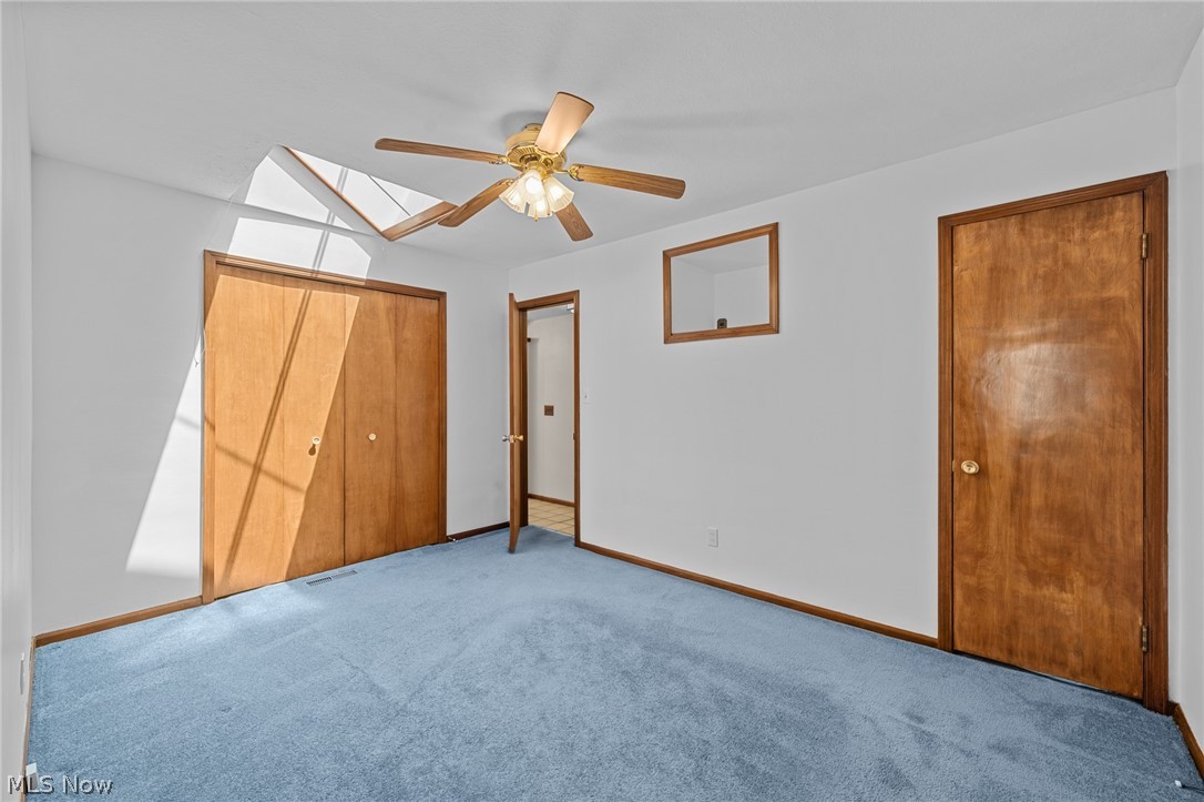 1759 Chelmsford Road Mayfield Heights, OH 44124 - Photo 19 of 39 The third bedroom has a double closet and skylights. Probably hardwood floors under the carpet in here as well.