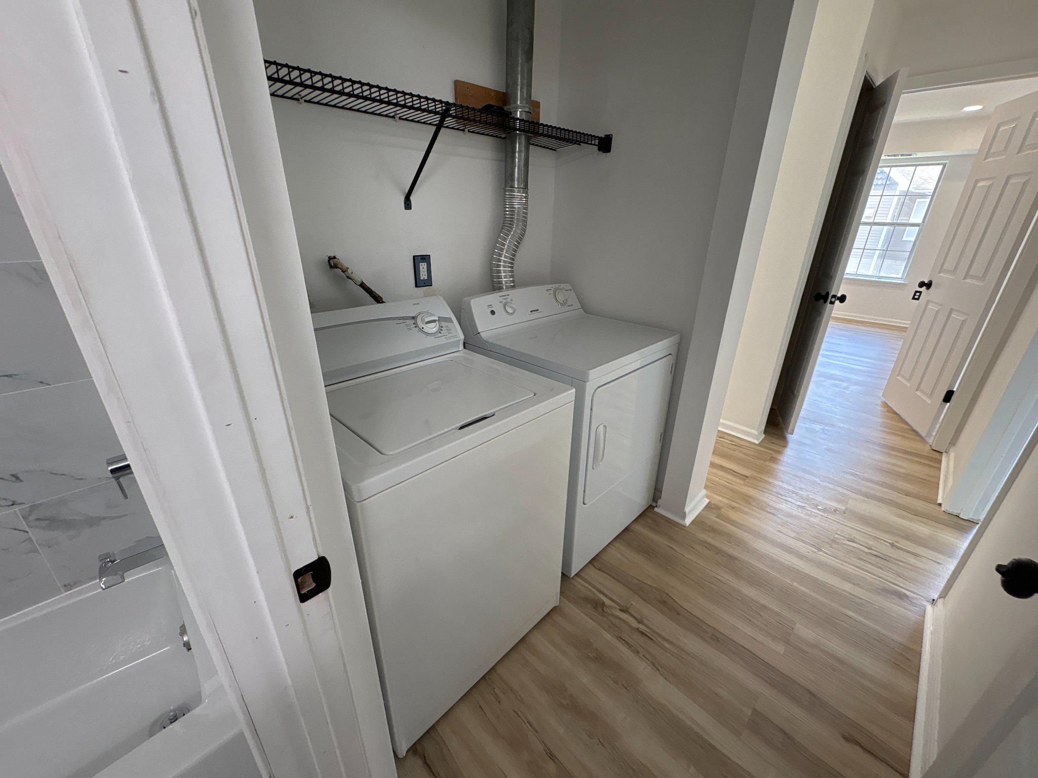 72304 Delaire Landing Road, Unit 304 Philadelphia, PA 19114 - Photo 42 of 56 Bright and functional laundry space.