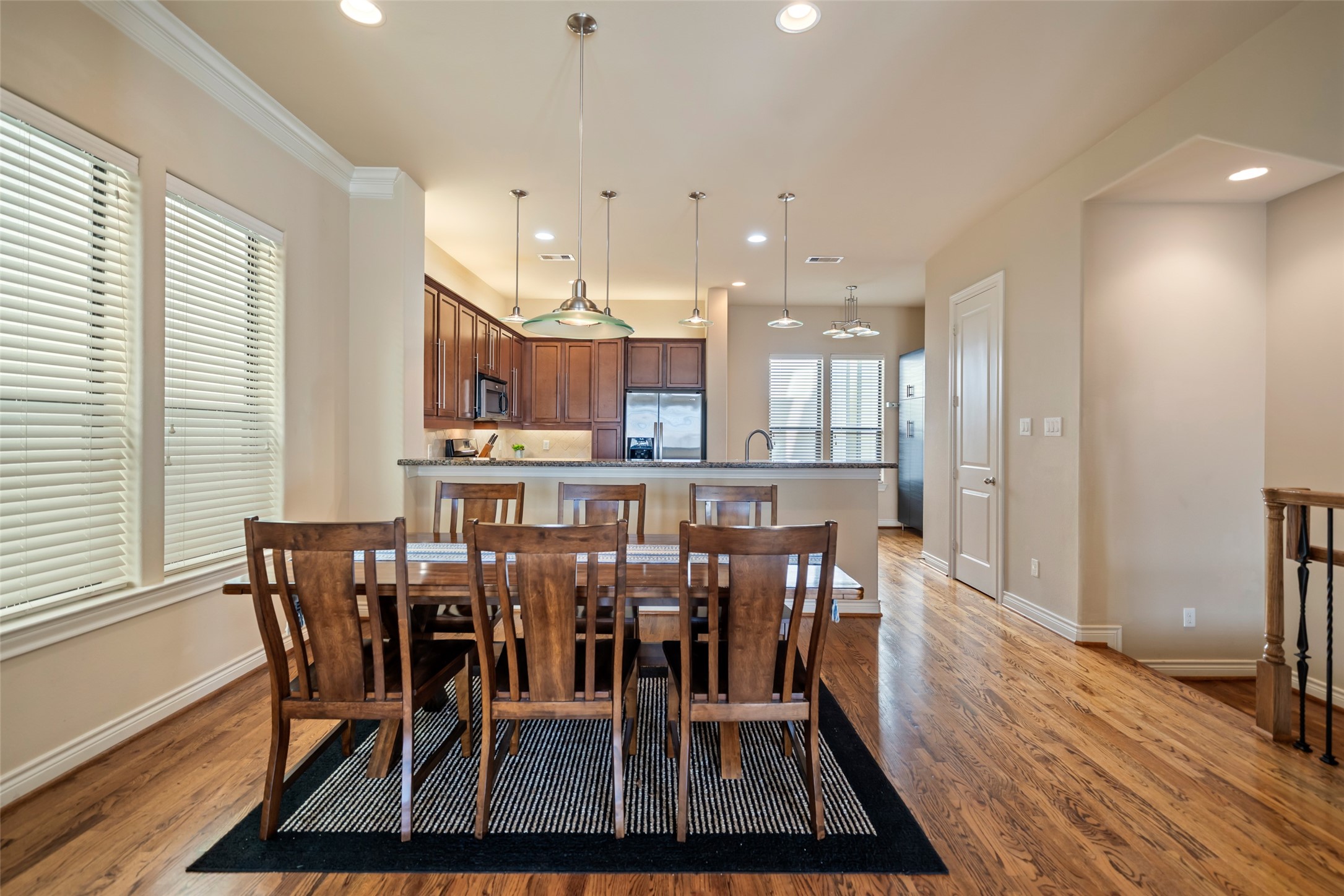 1728 Dart Street Houston, TX 77007 - Photo 12 of 37 a view of a dining room with furniture and wooden floor