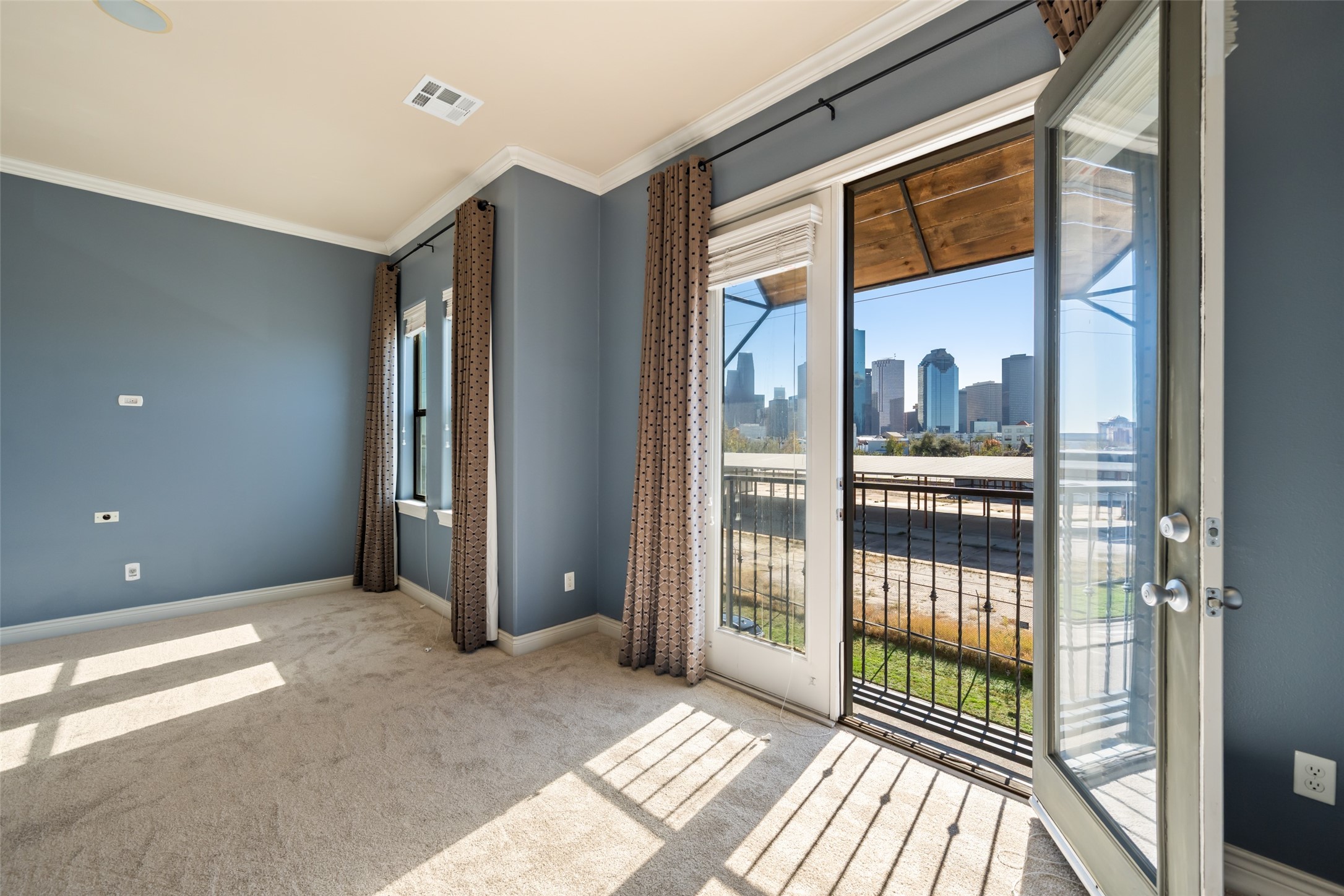 1728 Dart Street Houston, TX 77007 - Photo 26 of 37 a view of a room with wooden floor and windows