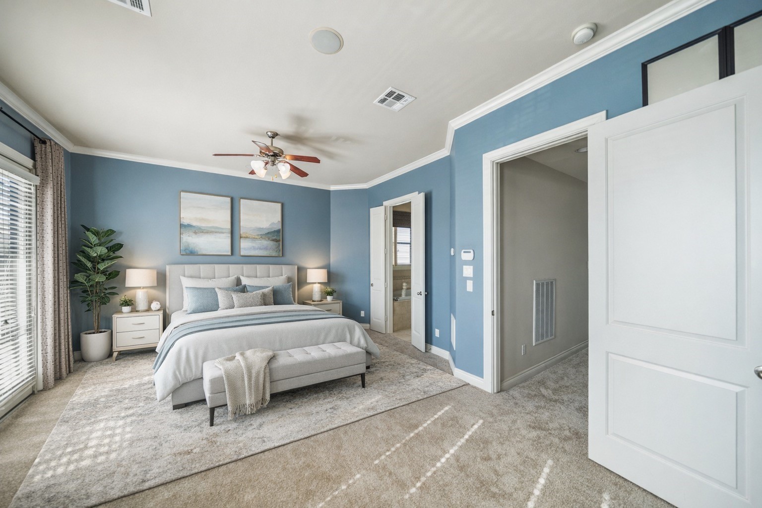 1728 Dart Street Houston, TX 77007 - Photo 27 of 37 a bedroom with a large bed and a chandelier