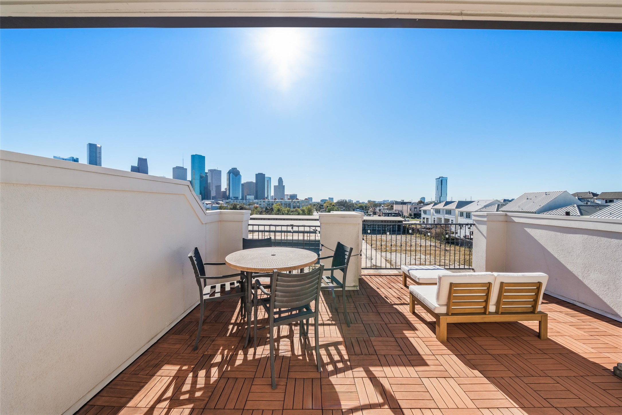 1728 Dart Street Houston, TX 77007 - Photo 31 of 37 a balcony with a table and chairs