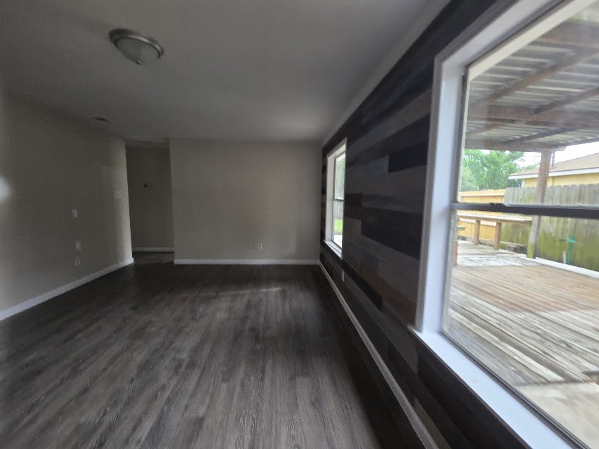 1110 Greencroft Street Channelview, TX 77530 - Photo 3 of 24 a view of a room with wooden floor