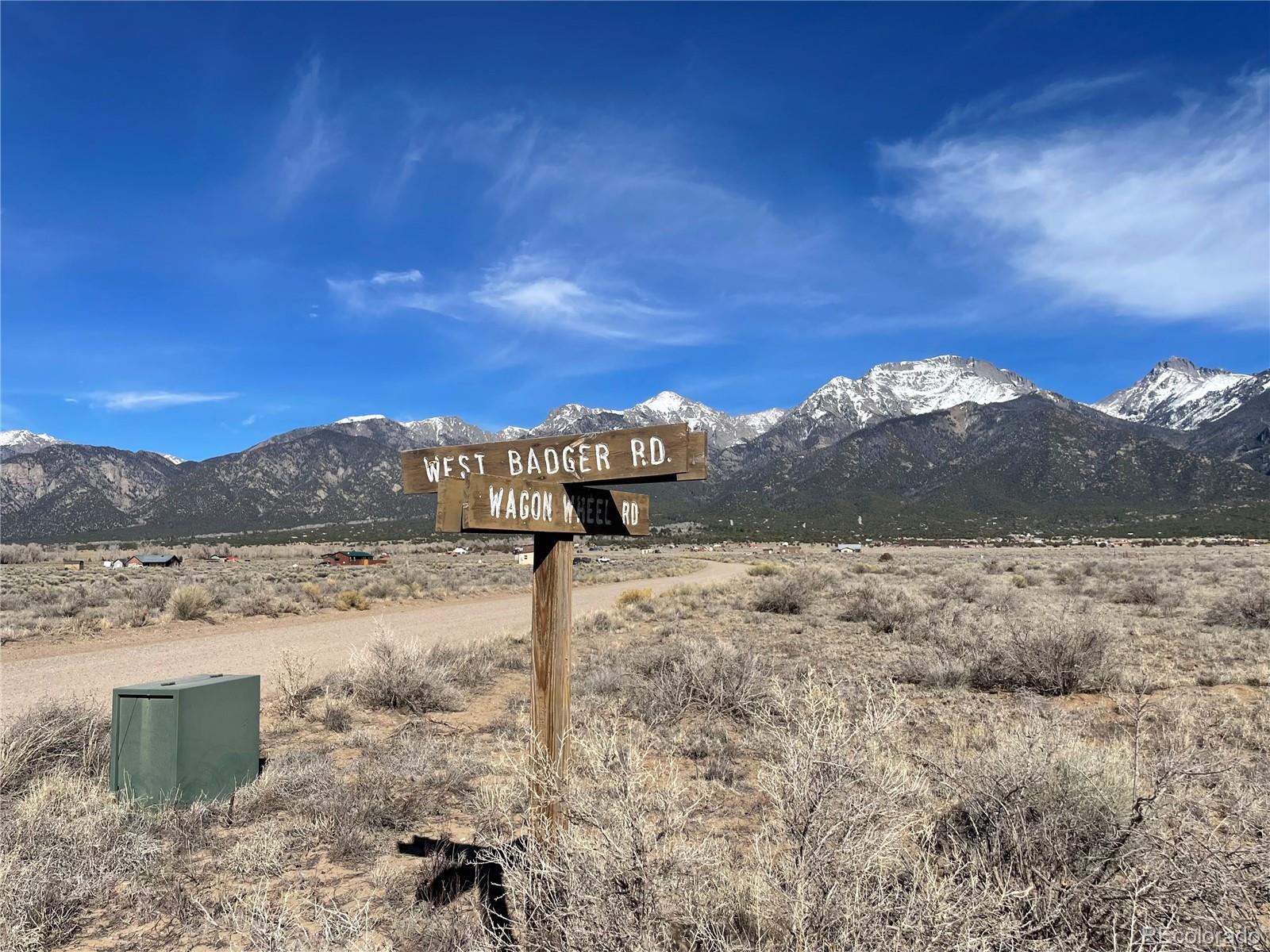 1402 Wagon Wheel Road Crestone, CO 81131 - Photo 9 of 10 a view of a dry yard with mountain