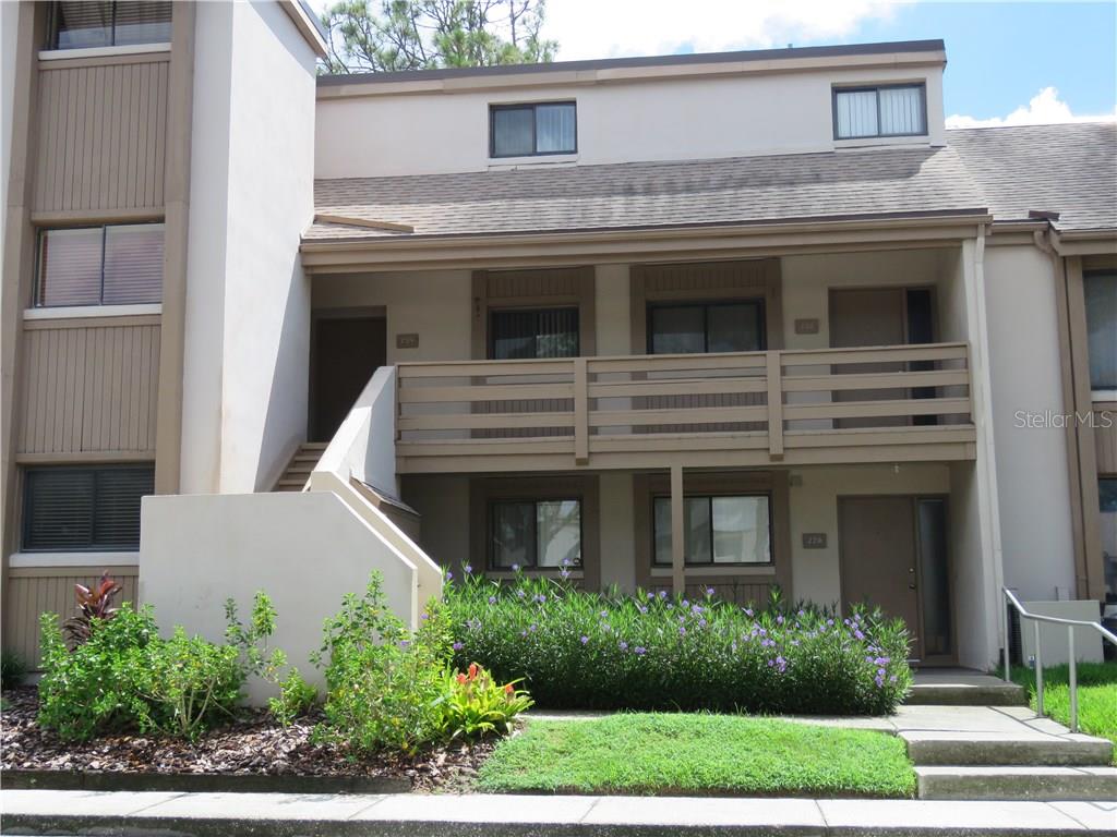 234 Orienta Point Street Altamonte Springs, FL 32701 - Photo 1 of 1 a front view of a house with garden