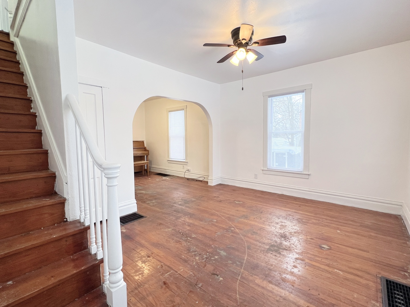 721 Dean Street, Unit 2 Woodstock, IL 60098 - Photo 2 of 17 a view of entryway and hall with wooden floor