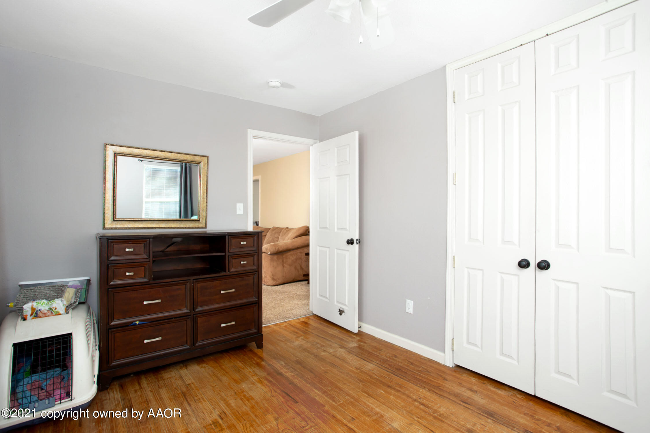 3807 South Jackson Street Amarillo, TX 79110 - Photo 13 of 17 a room with a dresser and a mirror
