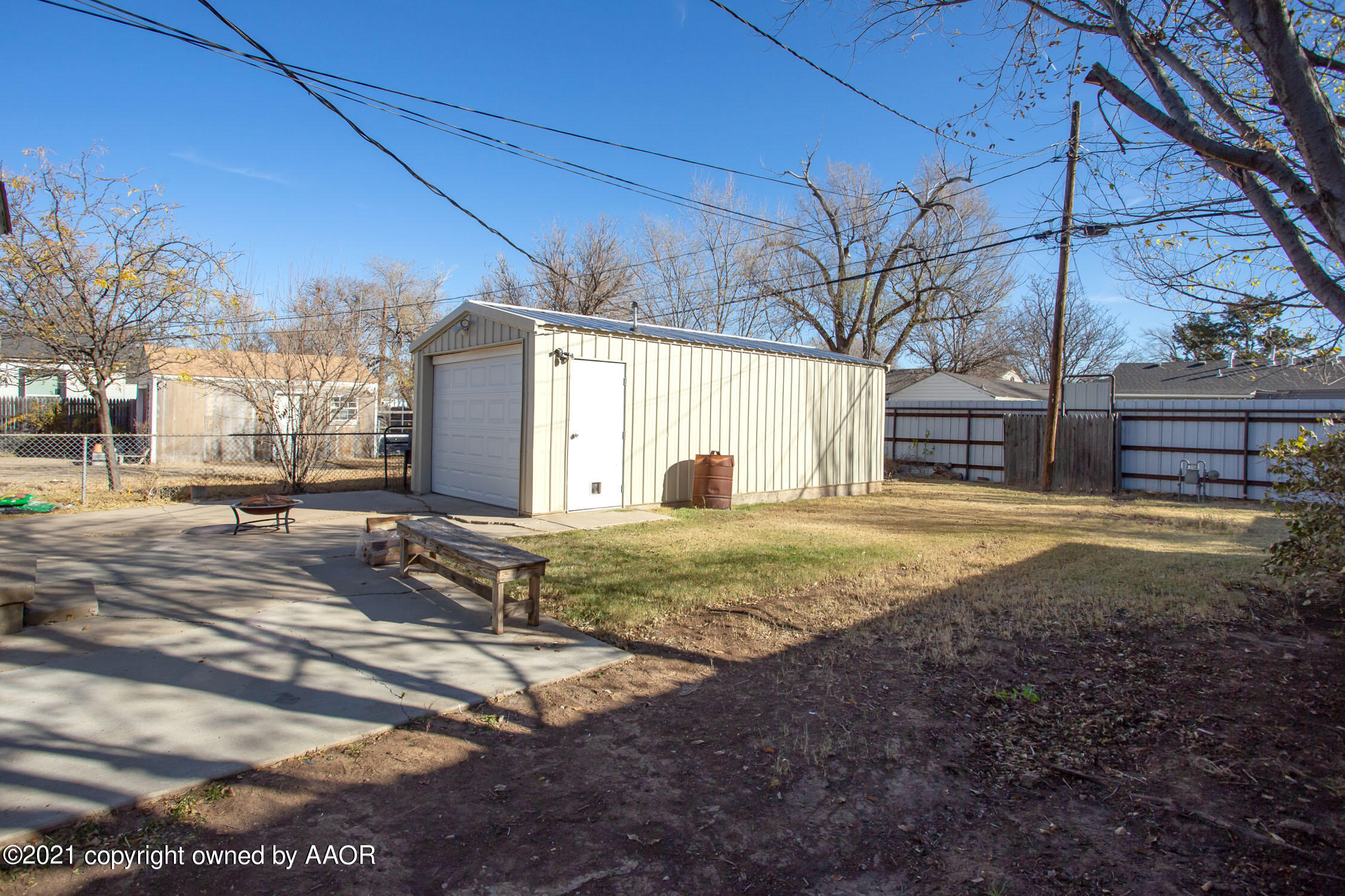 3807 South Jackson Street Amarillo, TX 79110 - Photo 14 of 17 a view of a backyard with large trees