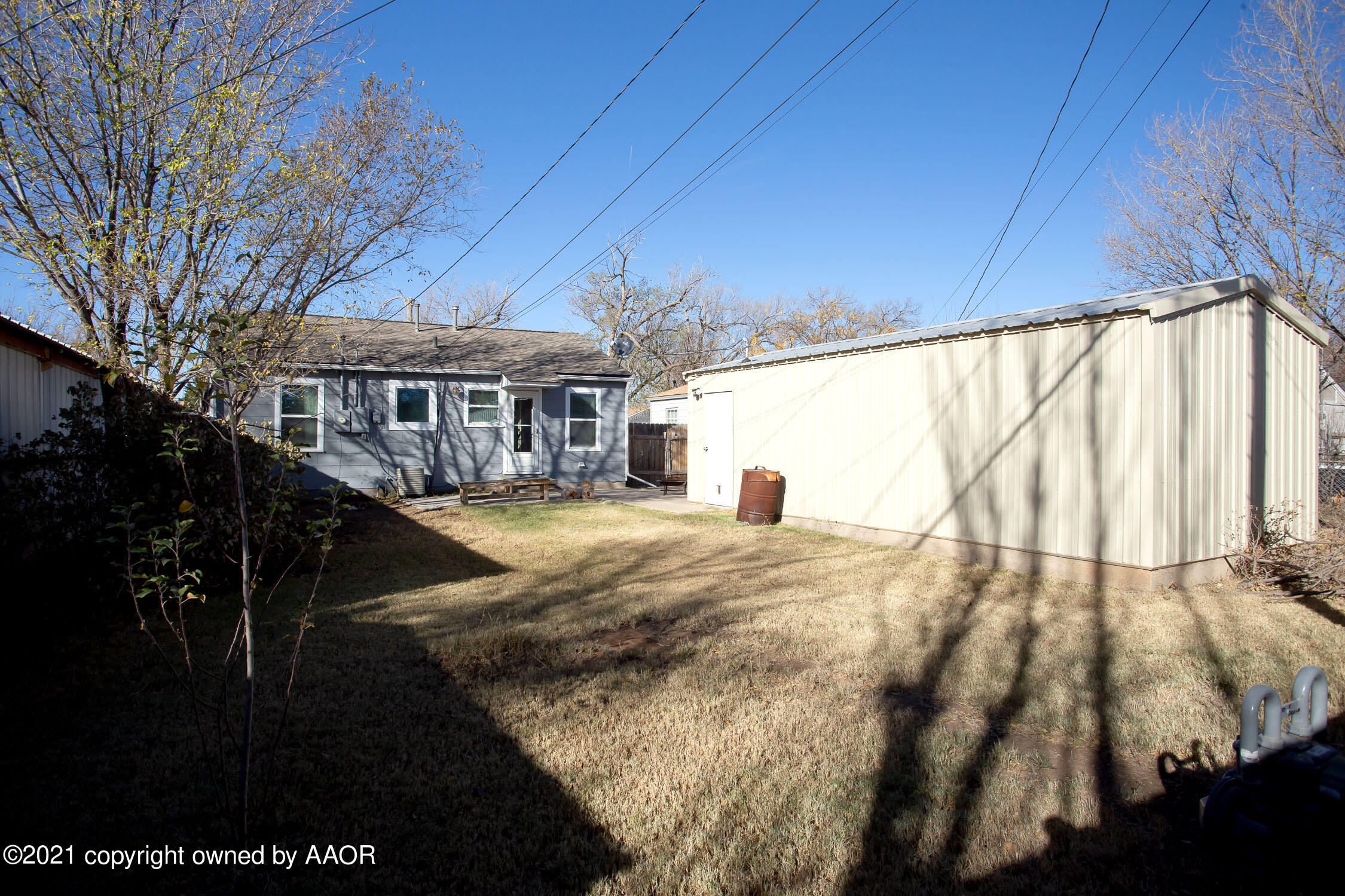 3807 South Jackson Street Amarillo, TX 79110 - Photo 17 of 17 a view of swimming pool with a yard