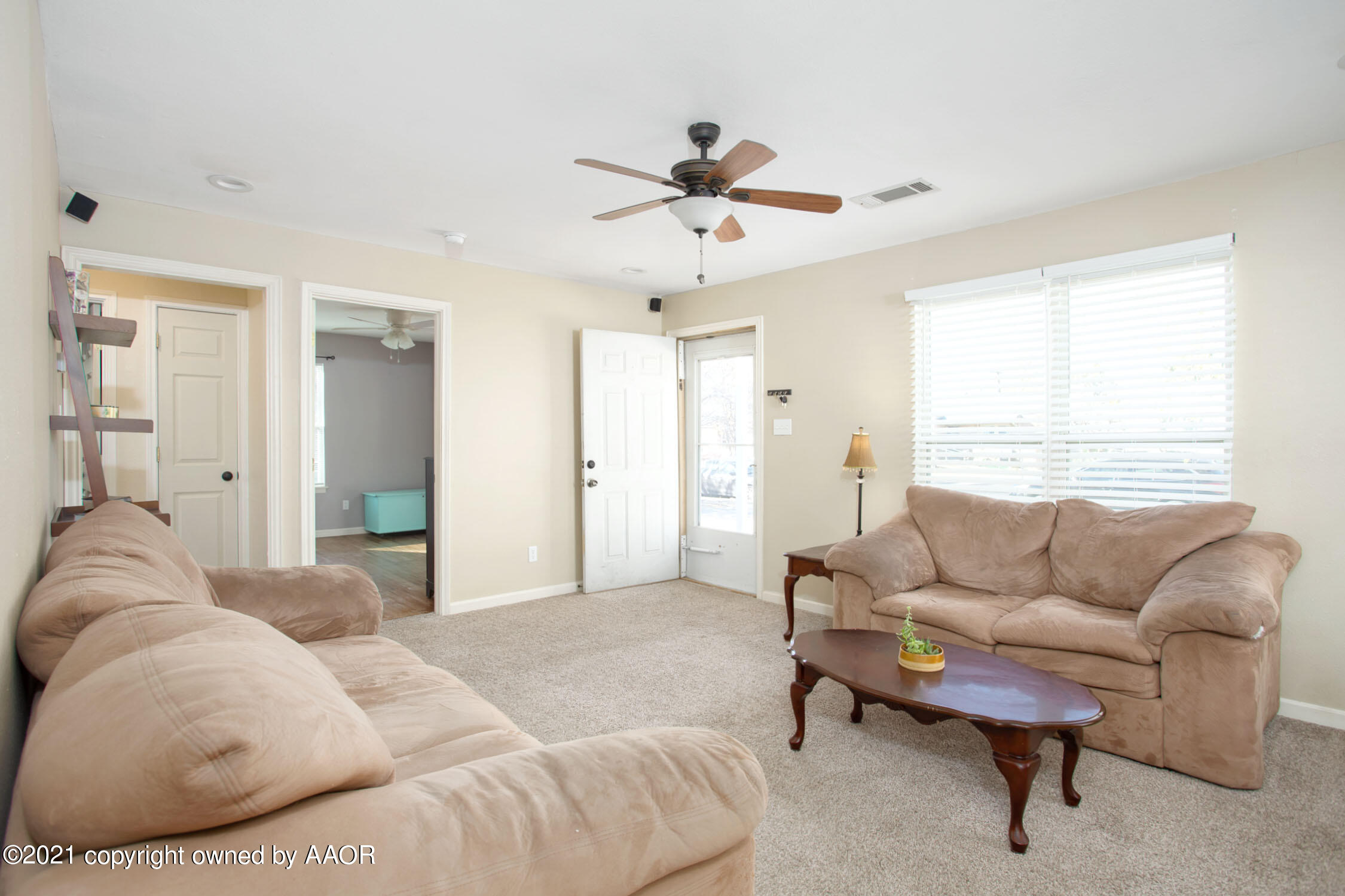 3807 South Jackson Street Amarillo, TX 79110 - Photo 5 of 17 a living room with furniture and a large window