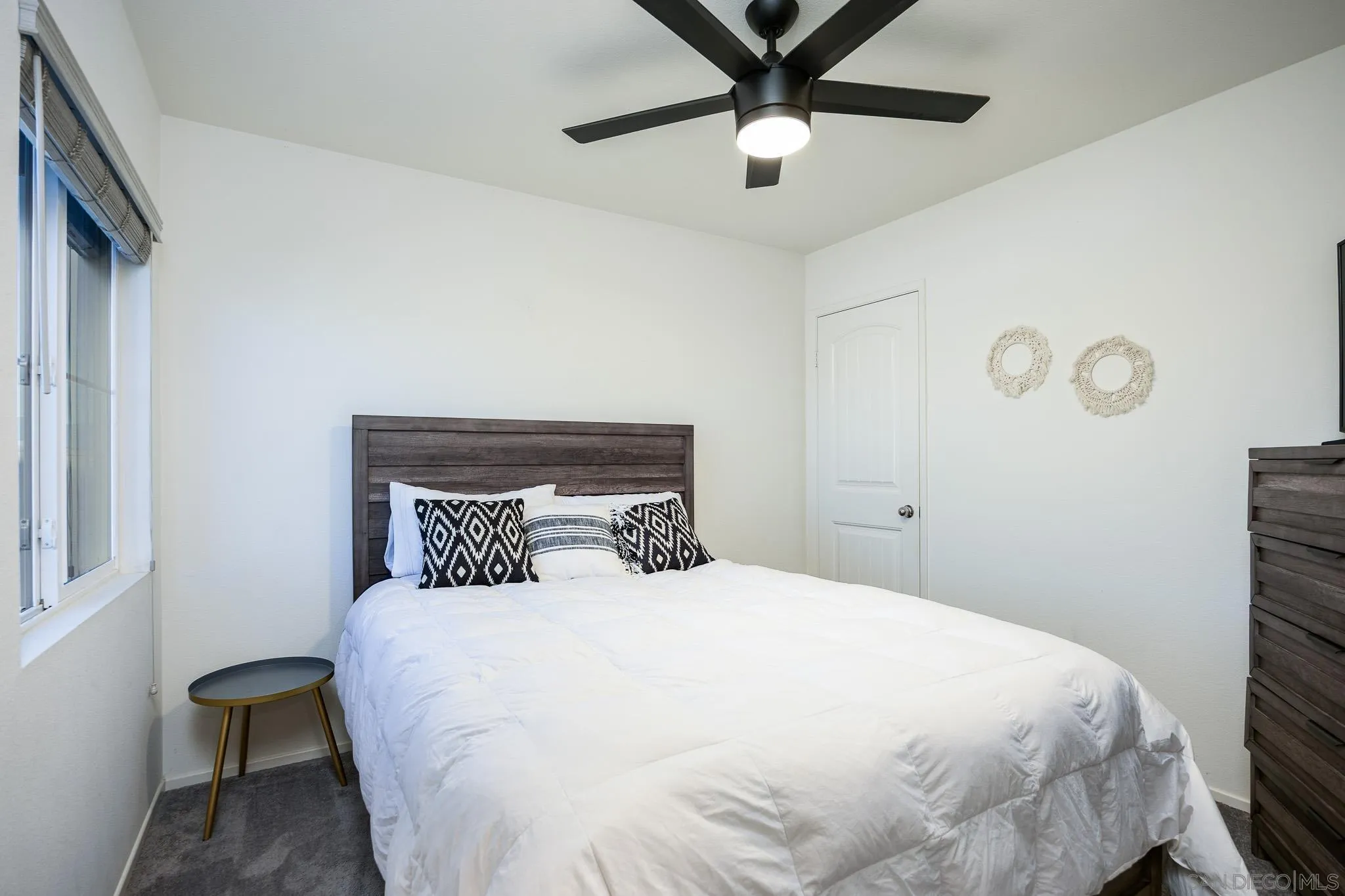 32089 Bunkhouse Road Winchester, CA 92596 - Photo 16 of 26 a large bed sitting in a bedroom next to a window