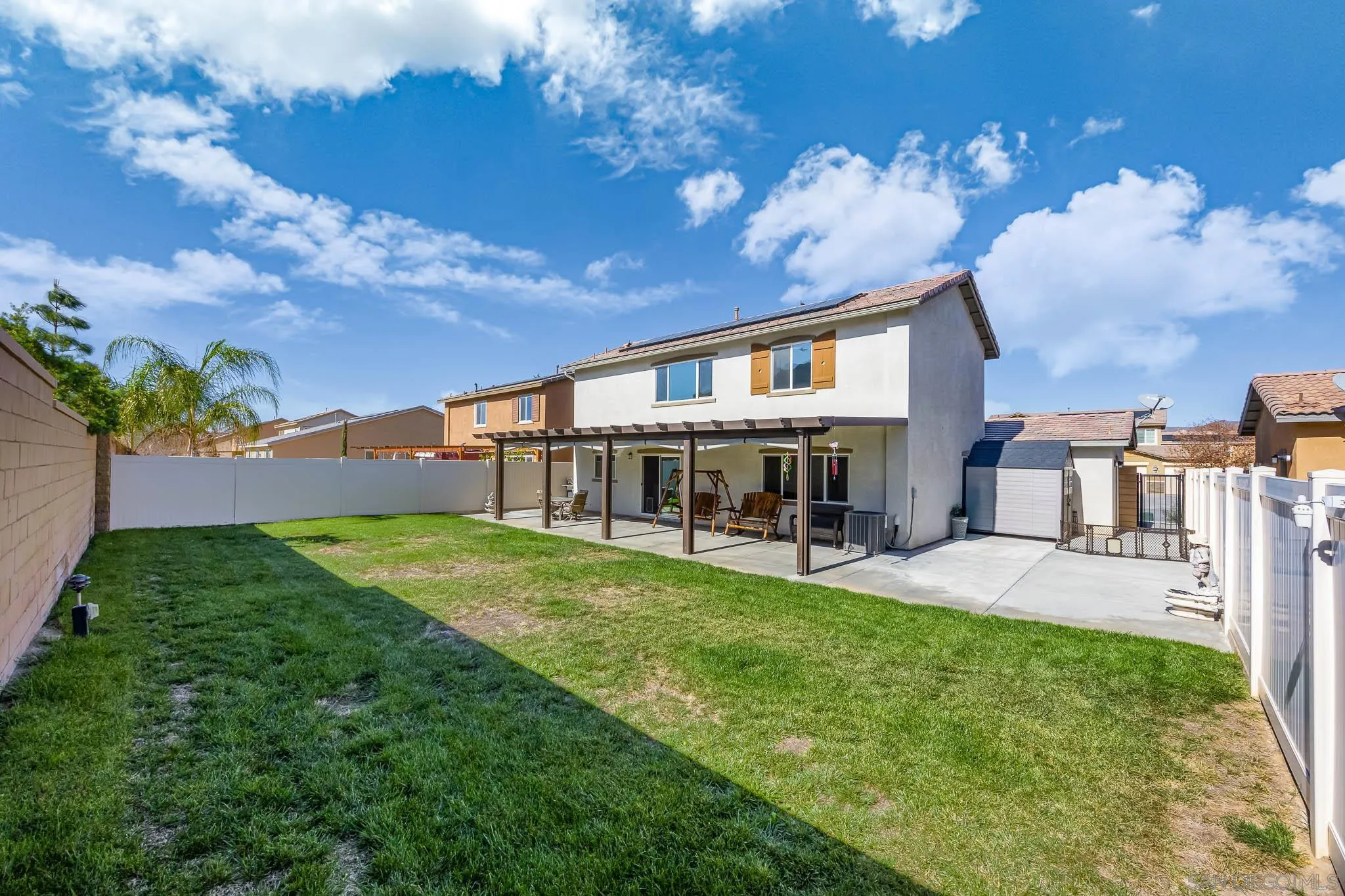 32089 Bunkhouse Road Winchester, CA 92596 - Photo 20 of 26 a view of a house with backyard porch and sitting area