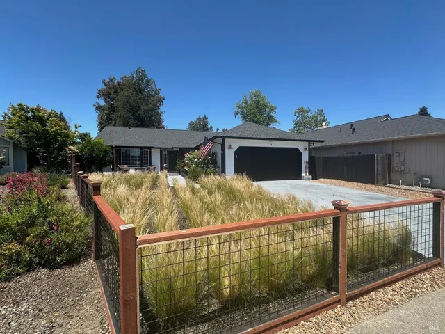a balcony with table and chairs