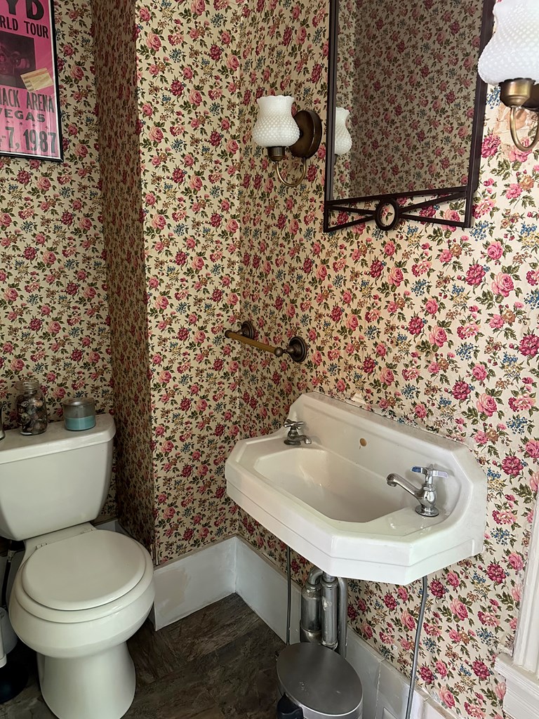 324 16th Street Franklin, PA 16323 - Photo 11 of 24 a bathroom with a toilet and a sink