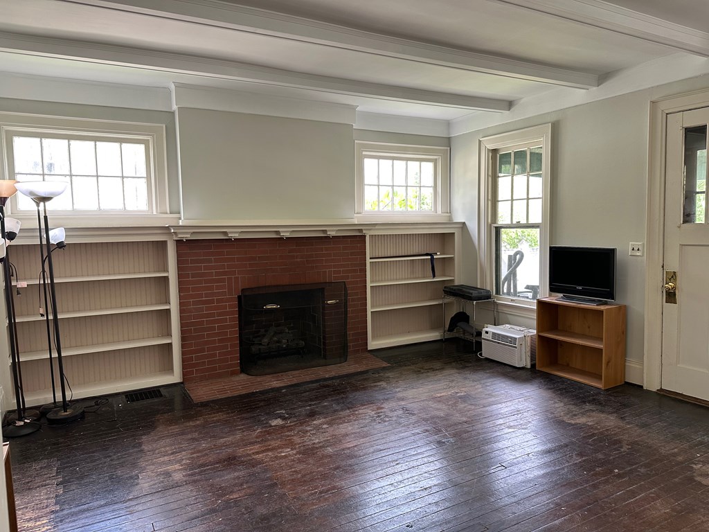 324 16th Street Franklin, PA 16323 - Photo 13 of 24 a view of a livingroom with furniture and a fireplace