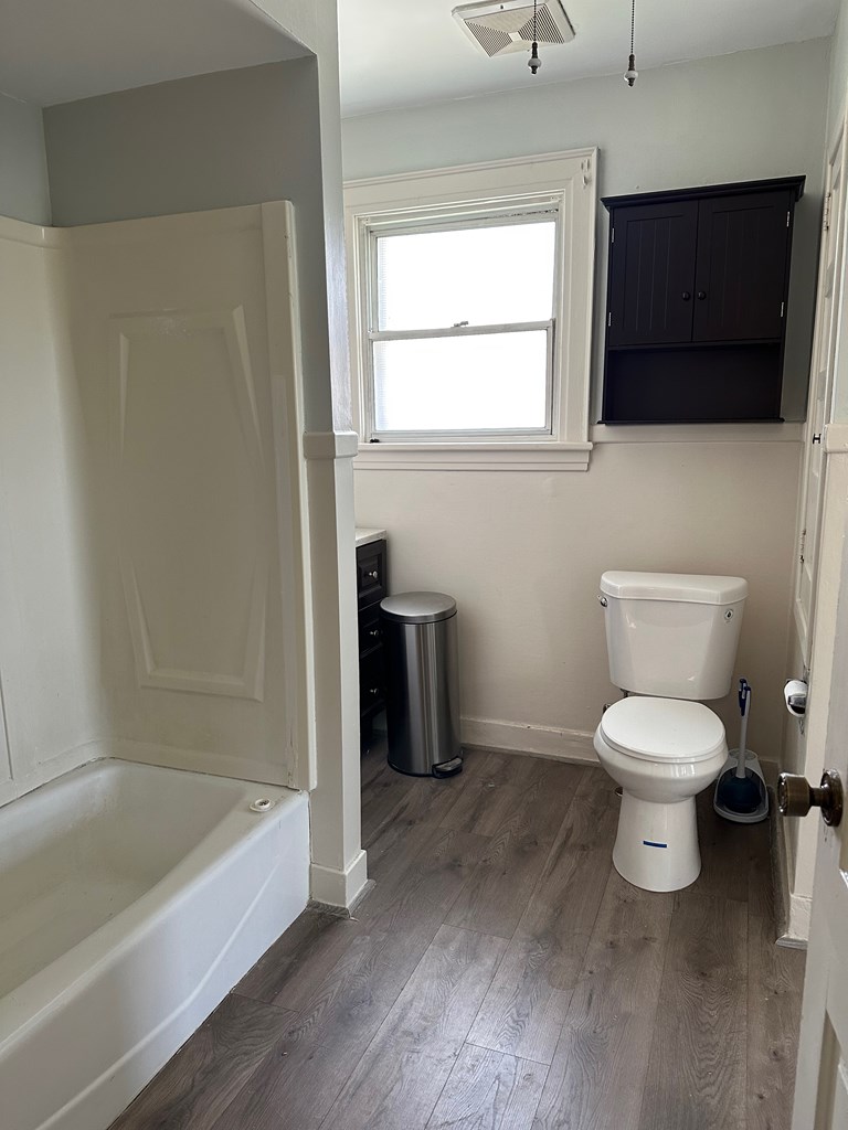 324 16th Street Franklin, PA 16323 - Photo 16 of 24 a bathroom with a toilet a sink and bathtub