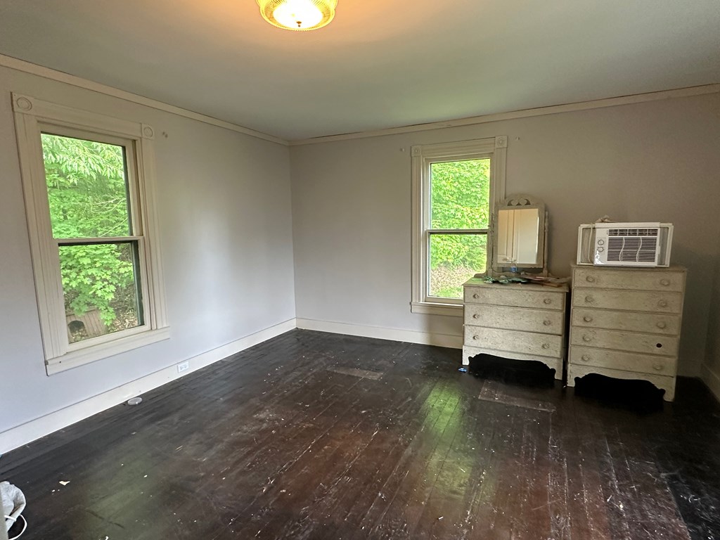 324 16th Street Franklin, PA 16323 - Photo 19 of 24 a bedroom with a bed and a window