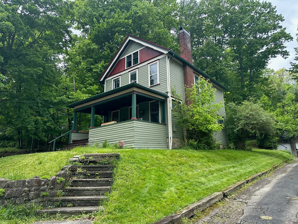324 16th Street Franklin, PA 16323 - Photo 24 of 24 a front view of house with yard and green space
