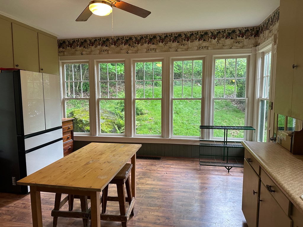 324 16th Street Franklin, PA 16323 - Photo 7 of 24 a kitchen with a table chairs and wooden floor