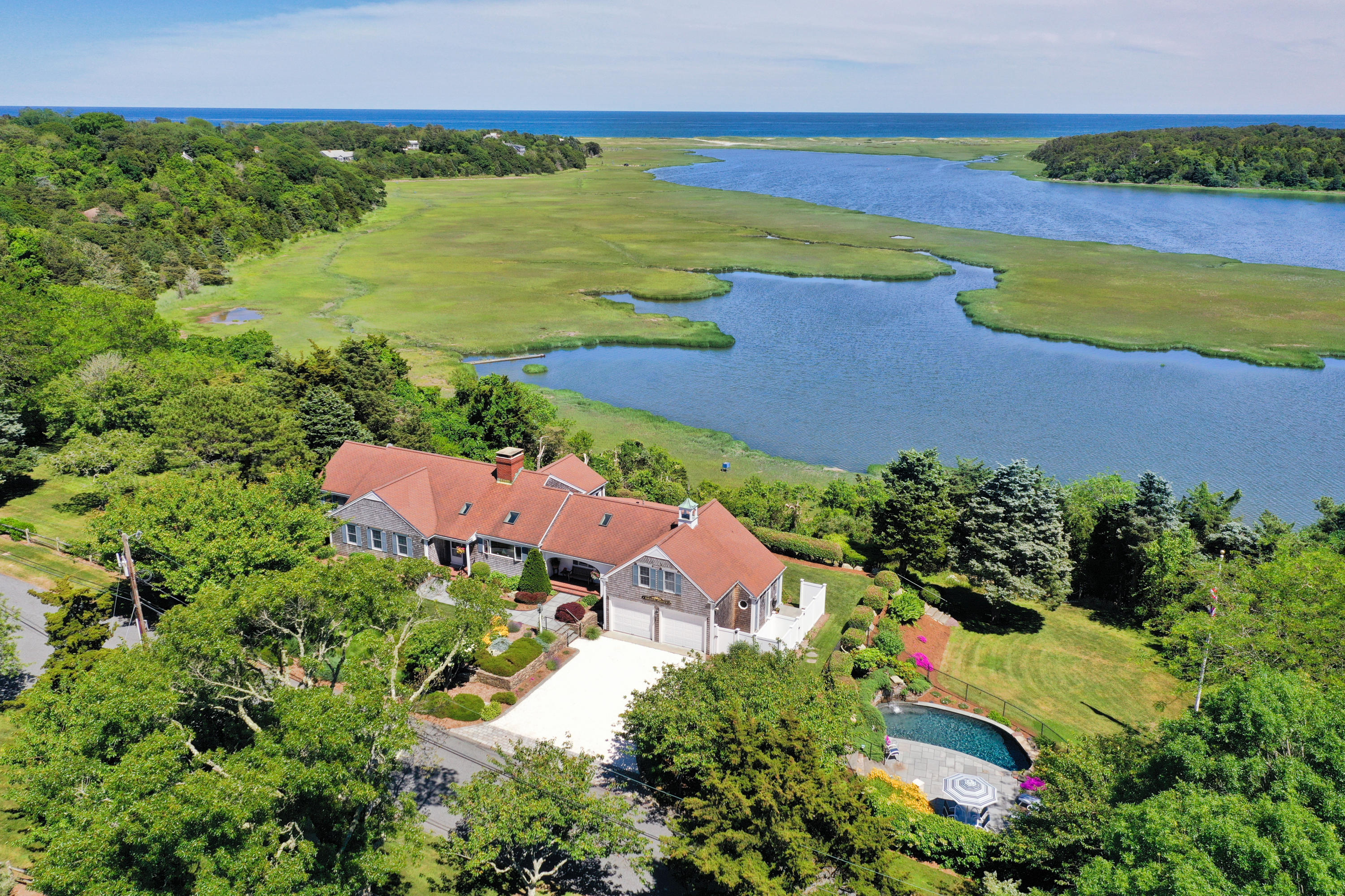 71 Briar Spring Road Orleans, MA 02653 - Photo 19 of 45 an aerial view of residential houses with outdoor space and lake view