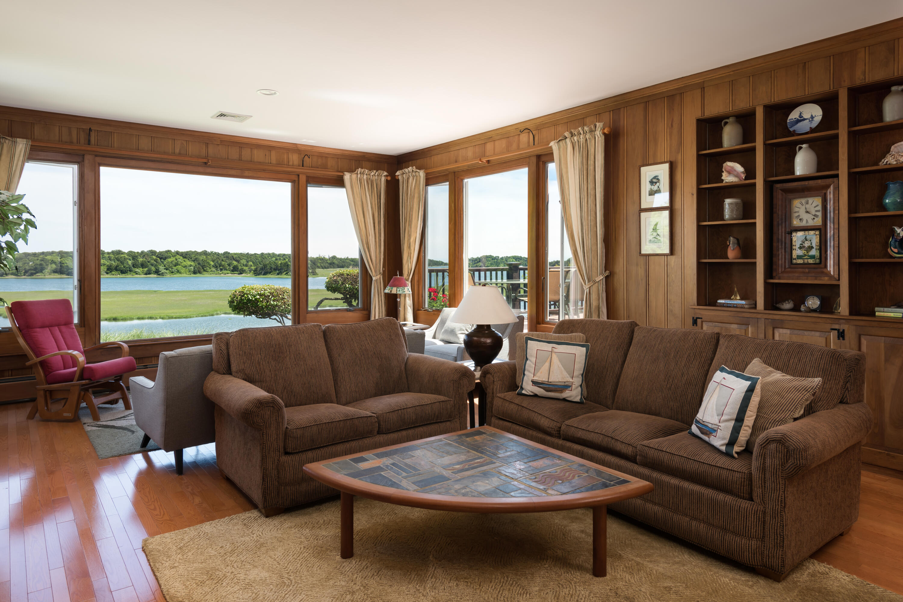 71 Briar Spring Road Orleans, MA 02653 - Photo 24 of 45 a living room with furniture and a large window
