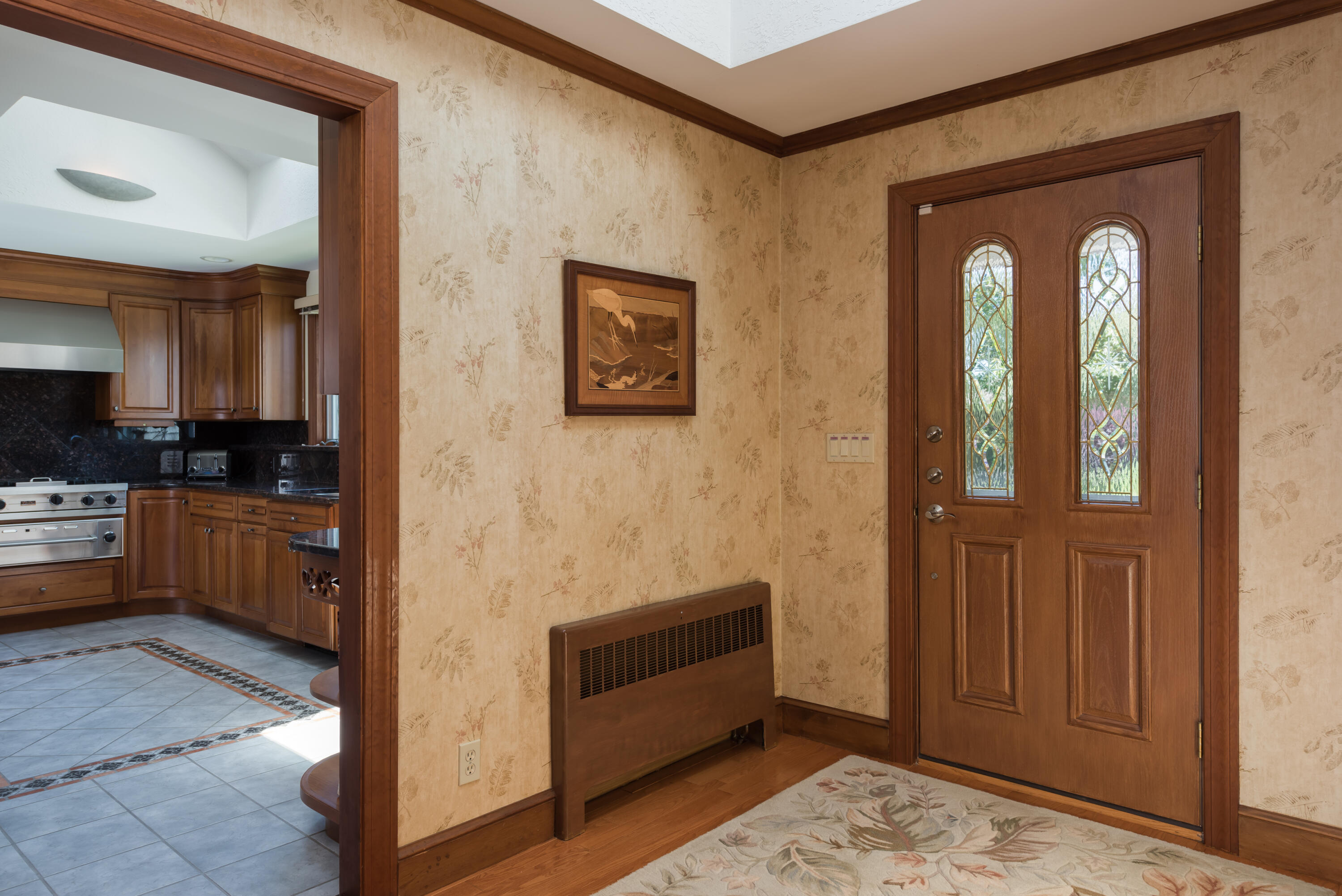 71 Briar Spring Road Orleans, MA 02653 - Photo 28 of 45 a hallway with a elevator and a view of living room